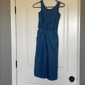 Girls size 7/8 denim one piece jump suit.